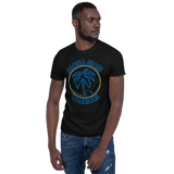 Young male wearing a Rhythm Arts Hawaii T-shirt that has a urban street themed graphic logo on the front.