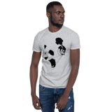 Young male wearing a Rhythm Arts Hawaii T-shirt that has a urban street themed graphic logo on the front.