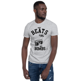 Young male wearing a Rhythm Arts Hawaii T-shirt that has a urban street themed graphic logo on the front.