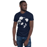 Young male wearing a Rhythm Arts Hawaii T-shirt that has a urban street themed graphic logo on the front.