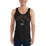 Young male wearing a Rhythm Arts Hawaii unisex tank top that has a urban street themed graphic logo on the front.