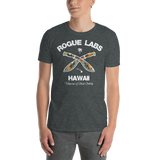 Young male wearing a Rogue Labs Hawaii T-shirt that has a urban street themed graphic logo on the front.