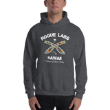 Young model wearing a Rogue Labs Hawaii unisex hoodie that has a urban street themed graphic logo on the front.
